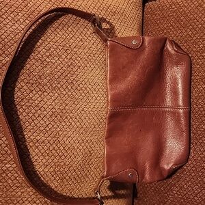 Great condition 10Lx7H real leather $10